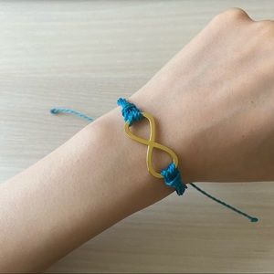Pura Vida gold infinity blue string bracelet
